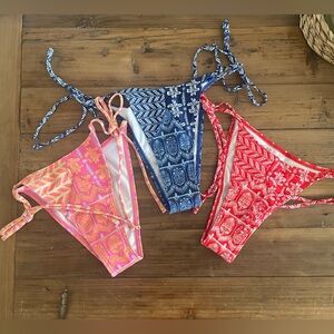 3 NEW bikini bottoms 
Size XS
